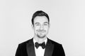 Young handsome man in a tuxedo, looking at the camera Royalty Free Stock Photo